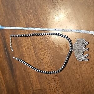 Buffalo necklace.